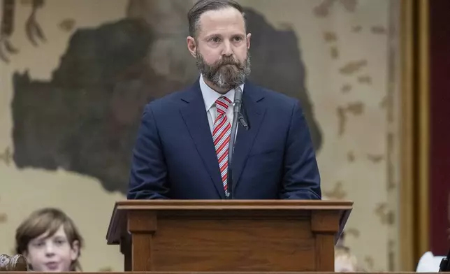 Texas state Rep. Dustin Burrows, R-Lubbock, addresses the members after being named speaker of the house during opening day of the 89th Texas Legislative Session in Austin, Texas, Tuesday, Jan. 14, 2025. (AP Photo/Stephen Spillman)