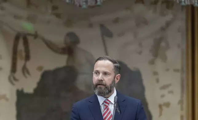 Texas state Rep. Dustin Burrows, R-Lubbock, addresses the members after being named speaker of the house during opening day of the 89th Texas Legislative Session in Austin, Texas, Tuesday, Jan. 14, 2025. (AP Photo/Stephen Spillman)