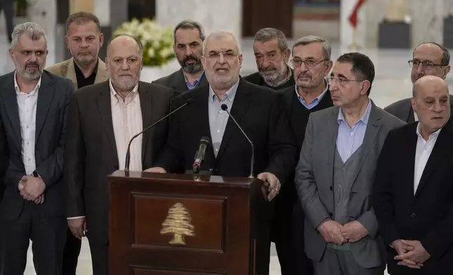 The head of Hezbollah's parliamentary bloc, Mohammed Raad, center, speaks to journalists after his meeting with Lebanese President Joseph Aoun, at the presidential palace in Baabda, east of Beirut, Lebanon, Monday, Jan. 13, 2025. (AP Photo/Bilal Hussein)