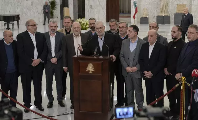 The head of Hezbollah's parliamentary bloc, Mohammed Raad, center, speaks to journalists after his meeting with Lebanese President Joseph Aoun at the presidential palace in Baabda, east of Beirut, Lebanon, Monday, Jan. 13, 2025. (AP Photo/Bilal Hussein)