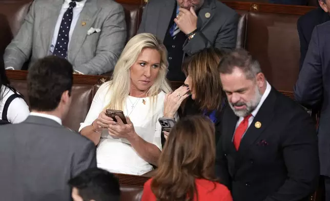 Rep. Marjorie Taylor Greene, R-Ga., seen as the House of Representatives convenes the 119th Congress with a slim Republican majority, at the Capitol in Washington, Friday, Jan. 3, 2025. (AP Photo/J. Scott Applewhite)