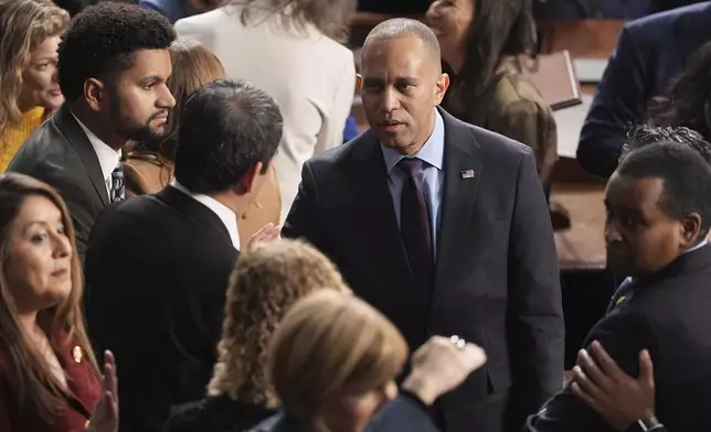 House Minority Leader Hakeem Jeffries, D-N.Y., right, and Rep. Maxwell Frost, D-Fla., left, are pictured as the House of Representatives meets to elect a speaker and convene the new 119th Congress at the Capitol in Washington, Friday, Jan. 3, 2025. (AP Photo/Jacquelyn Martin)