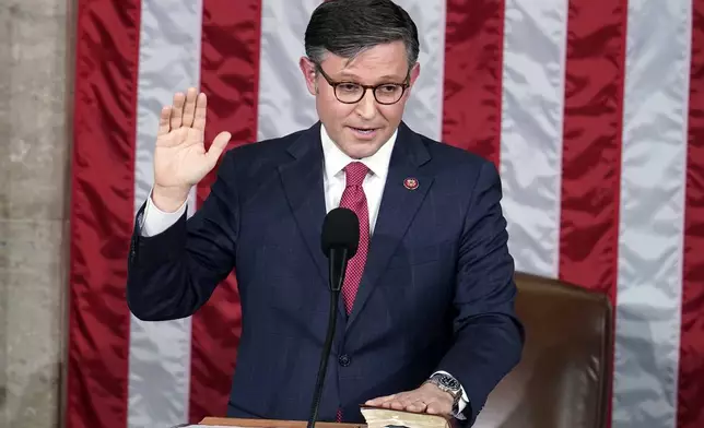 FILE - Rep. Mike Johnson, R-La., takes the oath to be the new House speaker from the Dean of the House Rep. Hal Rogers, R-Ky., at the Capitol in Washington, Wednesday, Oct. 25, 2023. (AP Photo/Alex Brandon, File)