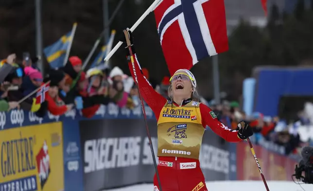 Norway's Therese Johaug wins the 10km women's mass start race of the Tour de Ski cross country, in Val di Fiemme, Italy, Sunday, Jan. 5, 2025. (AP Photo/Alessandro Trovati)