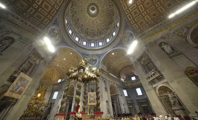 A view of St.Peter's Basilica as Pope Francis presides over an Epiphany mass at the Vatican, Monday, Jan. 6, 2025. (AP Photo/Alessandra Tarantino)