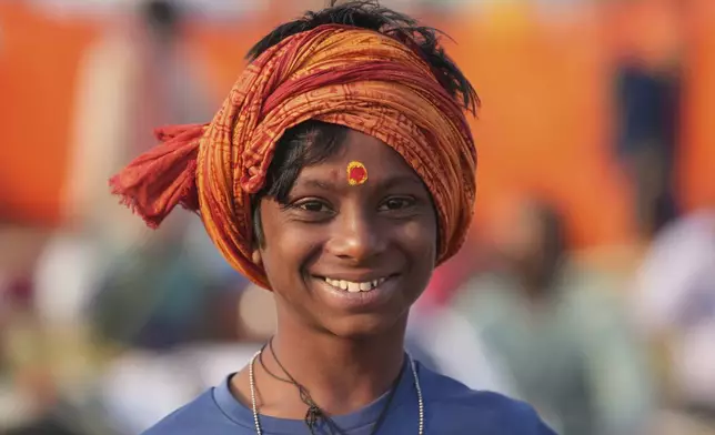 A young Hindu devotee wears a sacred mark on his forehead at the confluence of the Ganges, the Yamuna, and the Saraswati rivers during the 45-day-long Maha Kumbh festival in Prayagraj, India, Tuesday, Jan. 28, 2025. (AP Photo/Deepak Sharma)