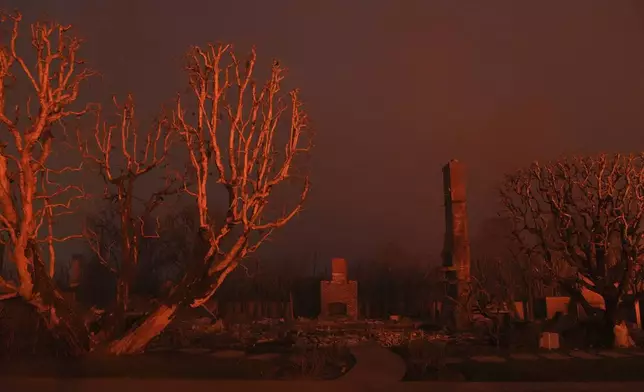 The ruins of a burned property in the Pacific Palisades neighborhood of Los Angeles, in the aftermath of the Palisades Fire, Thursday, Jan. 9, 2025. (AP Photo/Jae C. Hong)