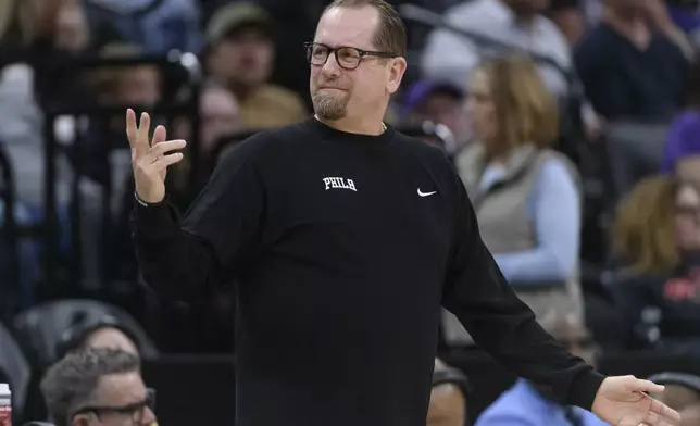 Philadelphia 76ers head coach Nick Nurse reacts to an official's call during the first half of an NBA basketball game against the Sacramento Kings in Sacramento, Calif., Wednesday, Jan. 1, 2025. (AP Photo/Randall Benton)