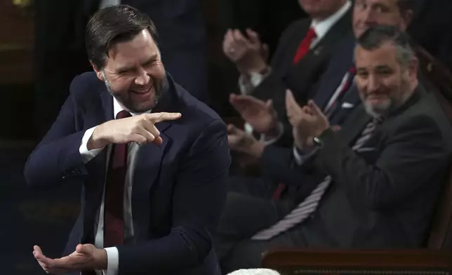 Vice President-elect JD Vance smiles after the certification for Ohio is read during a joint session of Congress to confirm the Electoral College votes, affirming President-elect Donald Trump's victory in the presidential election, Monday, Jan. 6, 2025, at the U.S. Capitol in Washington. (AP Photo/Matt Rourke)