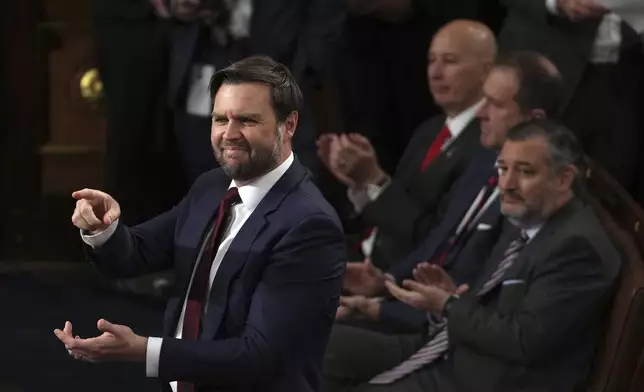 Vice President-elect JD Vance smiles after the certification for Ohio is read during a joint session of Congress to confirm the Electoral College votes, affirming President-elect Donald Trump's victory in the presidential election, Monday, Jan. 6, 2025, at the U.S. Capitol in Washington. (AP Photo/Matt Rourke)
