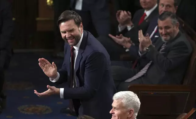 Vice President-elect JD Vance smiles after the certification for Ohio is read during a joint session of Congress to confirm the Electoral College votes, affirming President-elect Donald Trump's victory in the presidential election, Monday, Jan. 6, 2025, at the U.S. Capitol in Washington. (AP Photo/Matt Rourke)