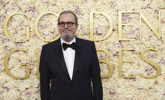 Gary Oldman arrives at the 82nd Golden Globes on Sunday, Jan. 5, 2025, at the Beverly Hilton in Beverly Hills, Calif. (Photo by Jordan Strauss/Invision/AP)