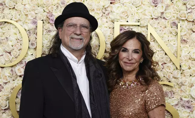 Glenn Weiss, left, and Jan Svendsen arrive at the 82nd Golden Globes on Sunday, Jan. 5, 2025, at the Beverly Hilton in Beverly Hills, Calif. (Photo by Jordan Strauss/Invision/AP)