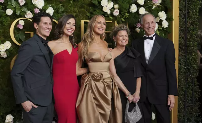 Matt Green, from left, Lauren Green, Nikki Glaser, Julie Glaser, and Edward Glaser arrive at the 82nd Golden Globes on Sunday, Jan. 5, 2025, at the Beverly Hilton in Beverly Hills, Calif. (Photo by Jordan Strauss/Invision/AP)