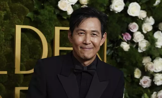 Lee Jung-jae arrives at the 82nd Golden Globes on Sunday, Jan. 5, 2025, at the Beverly Hilton in Beverly Hills, Calif. (Photo by Jordan Strauss/Invision/AP)