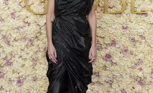 Coralie Fargeat arrives at the 82nd Golden Globes on Sunday, Jan. 5, 2025, at the Beverly Hilton in Beverly Hills, Calif. (Photo by Jordan Strauss/Invision/AP)