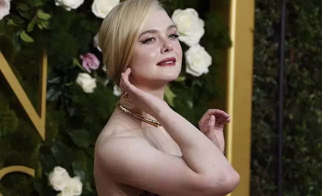 Elle Fanning arrives at the 82nd Golden Globes on Sunday, Jan. 5, 2025, at the Beverly Hilton in Beverly Hills, Calif. (Photo by Jordan Strauss/Invision/AP)