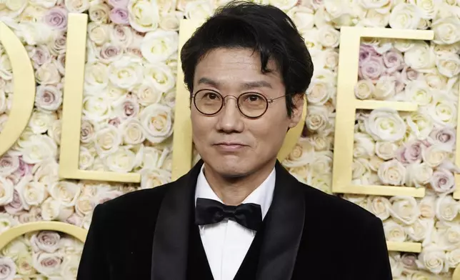 Hwang Dong-hyuk arrives at the 82nd Golden Globes on Sunday, Jan. 5, 2025, at the Beverly Hilton in Beverly Hills, Calif. (Photo by Jordan Strauss/Invision/AP)