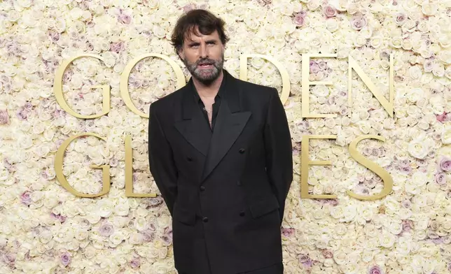 Andrew Wyatt arrives at the 82nd Golden Globes on Sunday, Jan. 5, 2025, at the Beverly Hilton in Beverly Hills, Calif. (Photo by Jordan Strauss/Invision/AP)