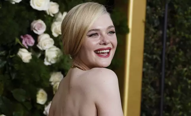 Elle Fanning arrives at the 82nd Golden Globes on Sunday, Jan. 5, 2025, at the Beverly Hilton in Beverly Hills, Calif. (Photo by Jordan Strauss/Invision/AP)