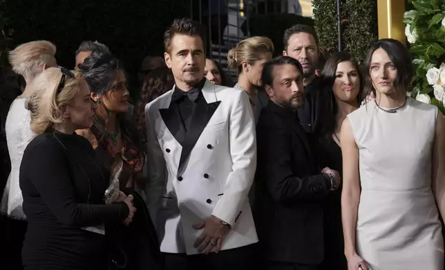 Salma Hayek, from left, Colin Farrell, Keiran Culkin, Ebon Moss-Bachrach, and Martina Scrinzi arrive at the 82nd Golden Globes on Sunday, Jan. 5, 2025, at the Beverly Hilton in Beverly Hills, Calif. (Photo by Jordan Strauss/Invision/AP)