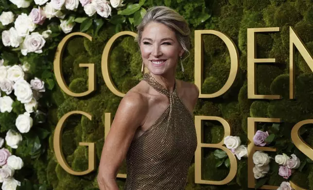 Elaine Irwin arrives at the 82nd Golden Globes on Sunday, Jan. 5, 2025, at the Beverly Hilton in Beverly Hills, Calif. (Photo by Jordan Strauss/Invision/AP)