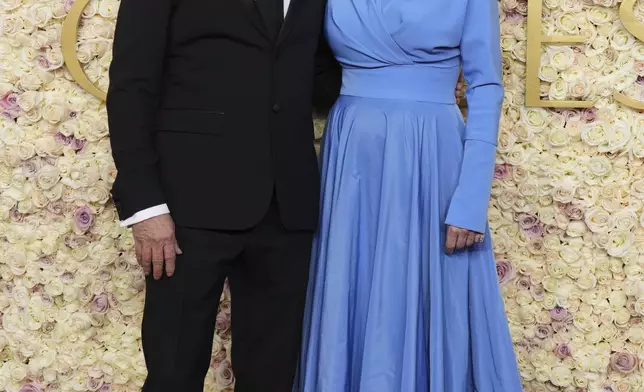 Joe Pacheco, left, and Jean Smart arrive at the 82nd Golden Globes on Sunday, Jan. 5, 2025, at the Beverly Hilton in Beverly Hills, Calif. (Photo by Jordan Strauss/Invision/AP)