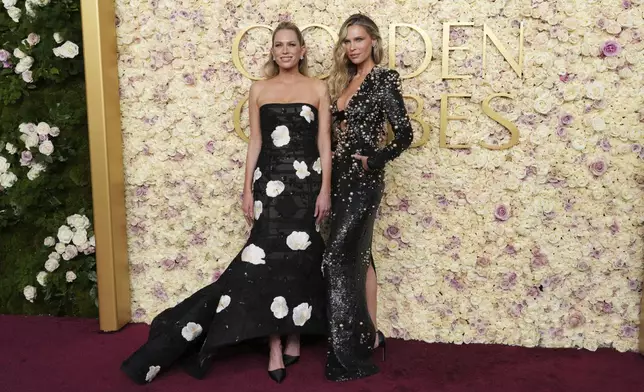 Erin Foster, left, and Sara Foster arrive at the 82nd Golden Globes on Sunday, Jan. 5, 2025, at the Beverly Hilton in Beverly Hills, Calif. (Photo by Jordan Strauss/Invision/AP)