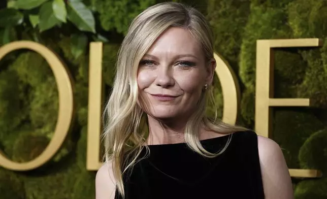 Kirsten Dunst arrives at the 82nd Golden Globes on Sunday, Jan. 5, 2025, at the Beverly Hilton in Beverly Hills, Calif. (Photo by Jordan Strauss/Invision/AP)