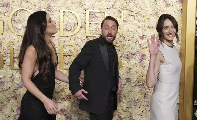 Jazz Charton, from left, Kieran Culkin, and Martina Scrinzi arrive at the 82nd Golden Globes on Sunday, Jan. 5, 2025, at the Beverly Hilton in Beverly Hills, Calif. (Photo by Jordan Strauss/Invision/AP)