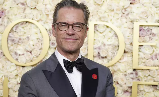 Guy Pearce arrives at the 82nd Golden Globes on Sunday, Jan. 5, 2025, at the Beverly Hilton in Beverly Hills, Calif. (Photo by Jordan Strauss/Invision/AP)