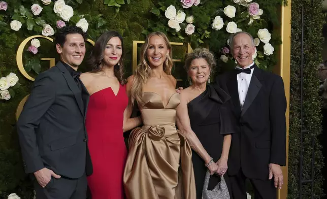 Matt Green, from left, Lauren Green, Nikki Glaser, Julie Glaser, and Edward Glaser arrive at the 82nd Golden Globes on Sunday, Jan. 5, 2025, at the Beverly Hilton in Beverly Hills, Calif. (Photo by Jordan Strauss/Invision/AP)