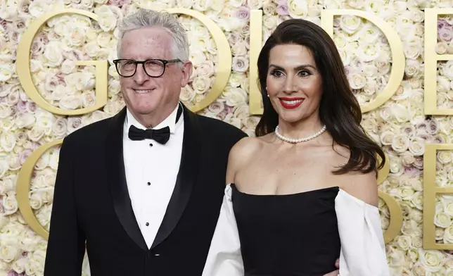 Uri Singer, left, and Roseli Singer arrive at the 82nd Golden Globes on Sunday, Jan. 5, 2025, at the Beverly Hilton in Beverly Hills, Calif. (Photo by Jordan Strauss/Invision/AP)