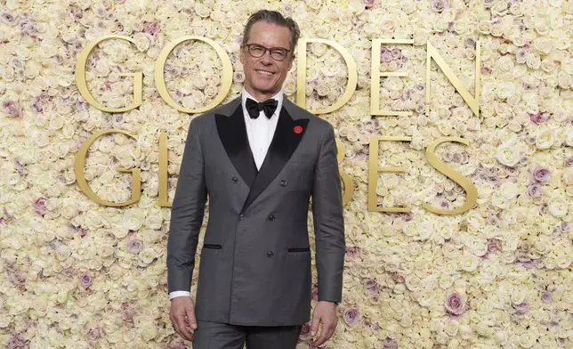 Guy Pearce arrives at the 82nd Golden Globes on Sunday, Jan. 5, 2025, at the Beverly Hilton in Beverly Hills, Calif. (Photo by Jordan Strauss/Invision/AP)