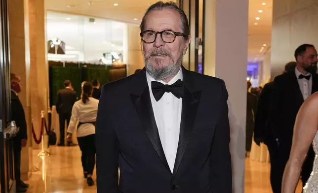 Gary Oldman arrives at the 82nd Golden Globes on Sunday, Jan. 5, 2025, at the Beverly Hilton in Beverly Hills, Calif. (AP Photo/Chris Pizzello)