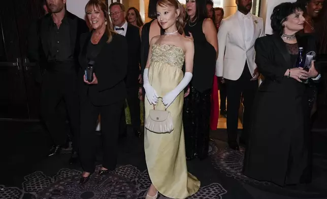 Ariana Grande arrives at the 82nd Golden Globes on Sunday, Jan. 5, 2025, at the Beverly Hilton in Beverly Hills, Calif. (AP Photo/Chris Pizzello)