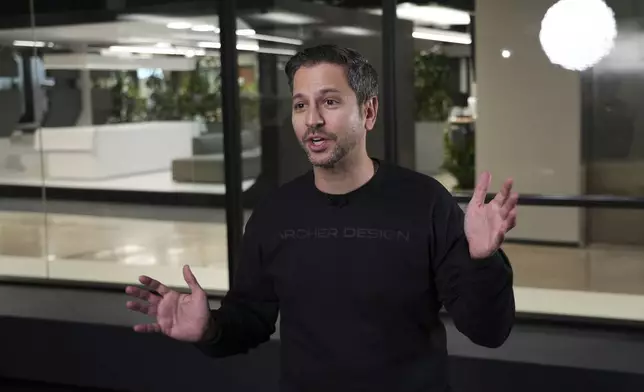 Archer Aviation CEO Adam Goldstein speaks at the company's headquarters in San Jose, Calif. on Friday, Dec. 13, 2024. (AP Photo/Terry Chea)