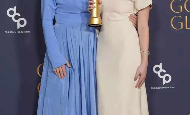 Jean Smart, left, and Hannah Einbinder pose in the press room with the award for best television series - musical or comedy for "Hacks" during the 82nd Golden Globes on Sunday, Jan. 5, 2025, at the Beverly Hilton in Beverly Hills, Calif. (AP Photo/Chris Pizzello)