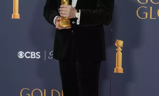 Hiroyuki Sanada poses in the press room with the award for best performance by an actor in a television series - drama for "Shogun" during the 82nd Golden Globes on Sunday, Jan. 5, 2025, at the Beverly Hilton in Beverly Hills, Calif. (AP Photo/Chris Pizzello)