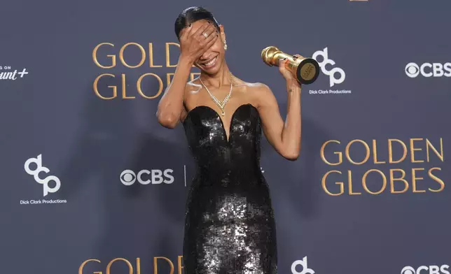 Zoe Saldana poses in the press room with the award for best performance by a female actor in a supporting role in any motion picture for "Emilia Perez" during the 82nd Golden Globes on Sunday, Jan. 5, 2025, at the Beverly Hilton in Beverly Hills, Calif. (AP Photo/Chris Pizzello)