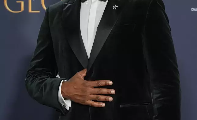 Anthony Mackie poses in the press room during the 82nd Golden Globes on Sunday, Jan. 5, 2025, at the Beverly Hilton in Beverly Hills, Calif. (AP Photo/Chris Pizzello)