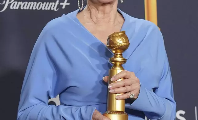 Jean Smart poses in the press room with the award for best performance by a female actor in a television series - musical or comedy for “Hacks” during the 82nd Golden Globes on Sunday, Jan. 5, 2025, at the Beverly Hilton in Beverly Hills, Calif. (AP Photo/Chris Pizzello)zello)