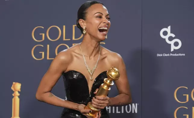 Zoe Saldana poses in the press room with the award for best performance by a female actor in a supporting role in any motion picture for "Emilia Perez" during the 82nd Golden Globes on Sunday, Jan. 5, 2025, at the Beverly Hilton in Beverly Hills, Calif. (AP Photo/Chris Pizzello)