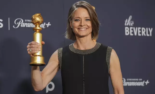 Jodie Foster poses in the press room with the award for best performance by a female actor in a limited series, anthology series, or a motion picture made for television for "True Detective: Night Country" during the 82nd Golden Globes on Sunday, Jan. 5, 2025, at the Beverly Hilton in Beverly Hills, Calif. (AP Photo/Chris Pizzello)