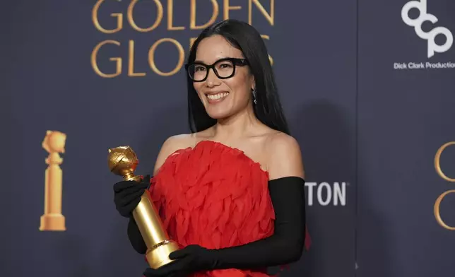 Ali Wong poses in the press room with the award for best performance in stand-up comedy on television for "Ali Wong: Single Lady" during the 82nd Golden Globes on Sunday, Jan. 5, 2025, at the Beverly Hilton in Beverly Hills, Calif. (AP Photo/Chris Pizzello)