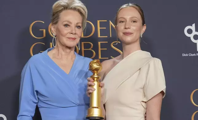 Jean Smart, left, and Hannah Einbinder pose in the press room with the award for best television series - musical or comedy for "Hacks" during the 82nd Golden Globes on Sunday, Jan. 5, 2025, at the Beverly Hilton in Beverly Hills, Calif. (AP Photo/Chris Pizzello)