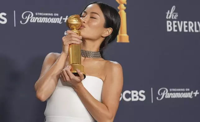 Anna Sawai poses in the press room with the award for best performance by a female actor in a television series - drama for "Shogun" during the 82nd Golden Globes on Sunday, Jan. 5, 2025, at the Beverly Hilton in Beverly Hills, Calif. (AP Photo/Chris Pizzello)