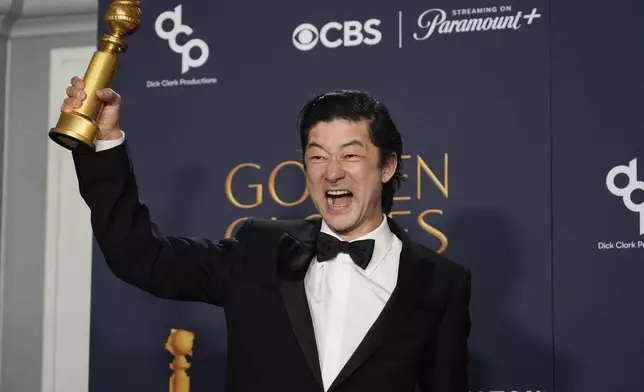 Tadanobu Asano poses in the press room with the award for best performance by a male actor in a supporting role on television for "Shogun" during the 82nd Golden Globes on Sunday, Jan. 5, 2025, at the Beverly Hilton in Beverly Hills, Calif. (AP Photo/Chris Pizzello)