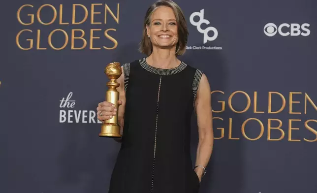 Jodie Foster poses in the press room with the award for best performance by a female actor in a limited series, anthology series, or a motion picture made for television for "True Detective: Night Country" during the 82nd Golden Globes on Sunday, Jan. 5, 2025, at the Beverly Hilton in Beverly Hills, Calif. (AP Photo/Chris Pizzello)