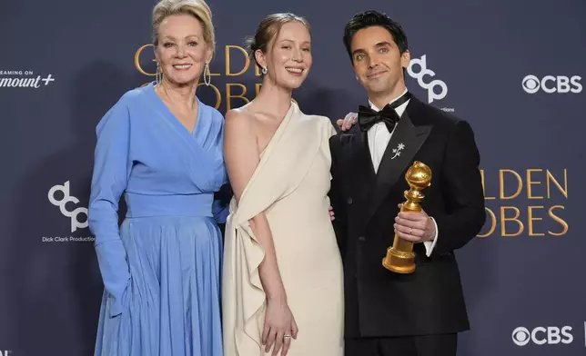 Jean Smart, from left, Hannah Einbinder, and Paul W. Downs pose in the press room with the award for best television series - musical or comedy for "Hacks" during the 82nd Golden Globes on Sunday, Jan. 5, 2025, at the Beverly Hilton in Beverly Hills, Calif. (AP Photo/Chris Pizzello)